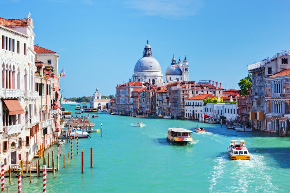 Venice, Italy. Grand Canal and Basilica Santa Maria della Salute at sunny day. View from Ponte dell Accademia